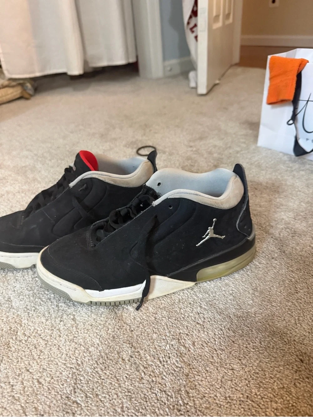 Jordan Men’s Black and White Low-Top Sneakers with Red Accent